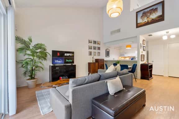 Waterfront Loft w/ Pool + Park Views and Balcony - Image 1